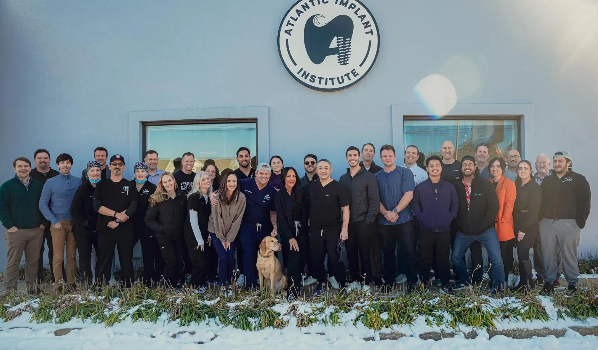 Course cohort gathered outside the Atlantic Implant Institute